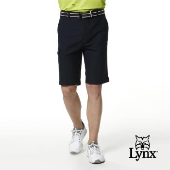 【Lynx Golf】男款彈性舒適側袋設計素面基本款平面休閒短褲-深藍色
