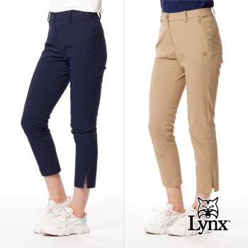 【Lynx Golf】女款彈性舒適隱形拉鍊口袋山貓膠標造型褲口開杈設計窄管九分褲(二色)