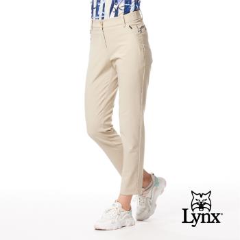 【Lynx Golf】女款日本進口布料抗UV接觸冷感機能織帶剪接設計草寫繡花造型窄管九分褲-卡其色