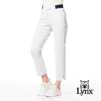 【Lynx Golf】女款日本進口布料彈性舒適隱形拉鍊口袋設計褲口開杈造型窄管九分褲-淺灰色