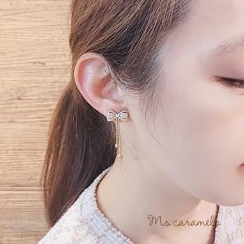 【焦糖小姐 Ms caramelo】 夾式 貝珠+流蘇鋯石耳環